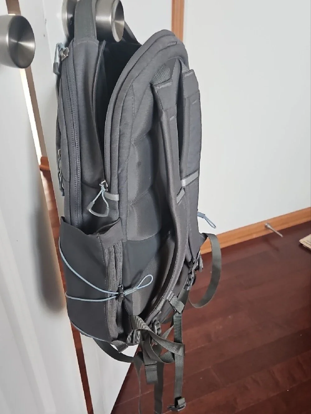 The North Face Grey Backpack with Light Blue Bungee Cord
